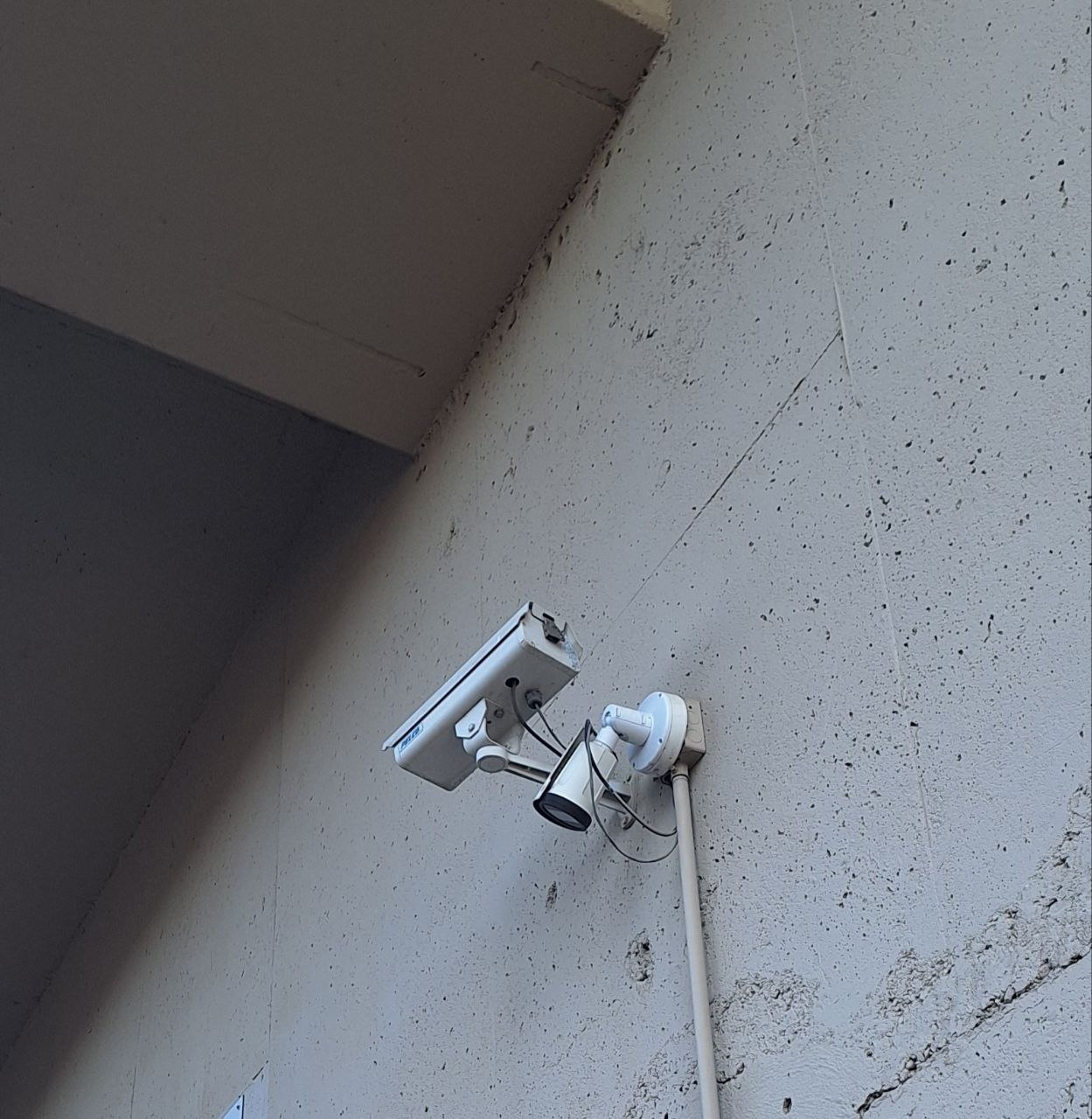 Weatherproof outdoor camera setup on a Calgary property
